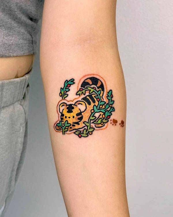 Cute cartoon tiger tattoo by @xinamon_tattoo