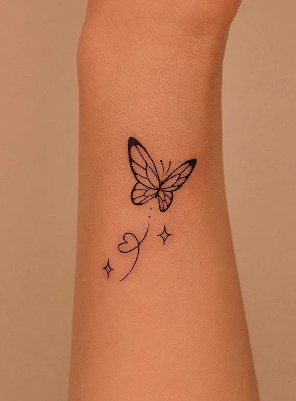 Cute little butterfly forearm tattoo by @tattooer_jina