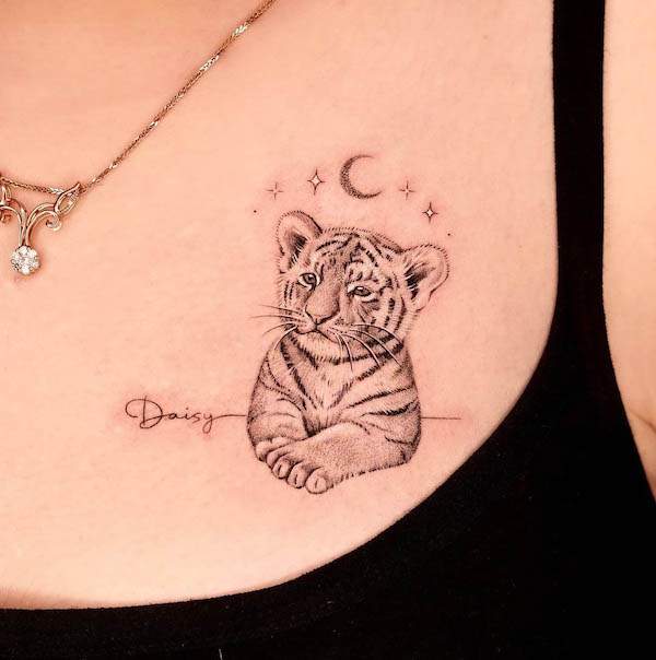 Cute name and tiger side chest tattoo by @kathy_tattoo