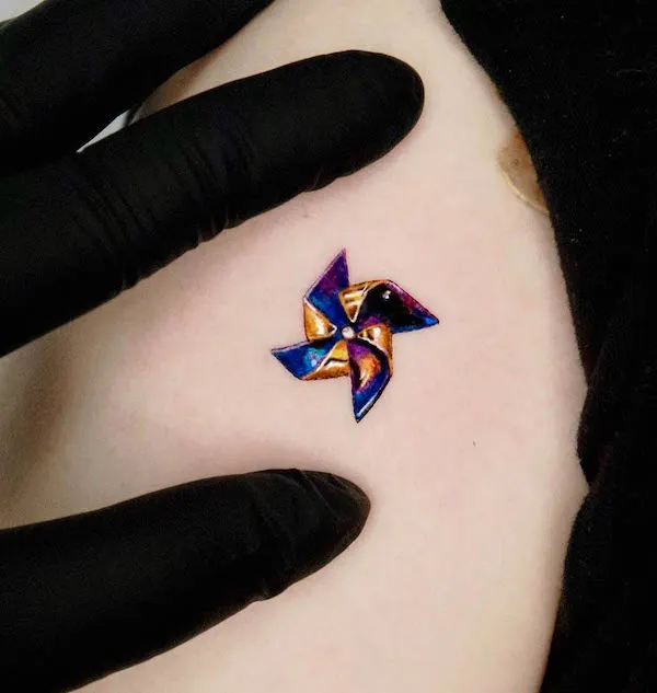 Cute paper windmill tattoo by @tattooist_irae2