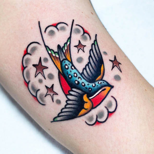 Cute traditional swallow by @miguelcomintattooer