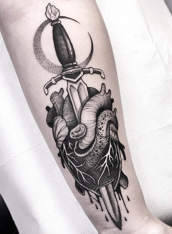 Dagger through the heart tattoo by @franki_tattoo