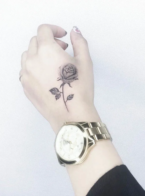 Dainty rose hand tattoo by @jiayu77121