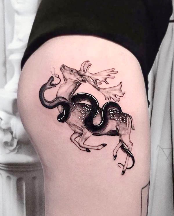 Deer and snake hip tattoo by @dnielbarreto