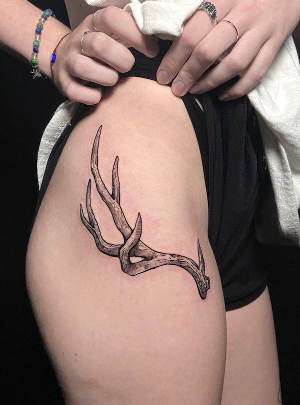 Deer antler thigh tattoo by @whiskerfruit