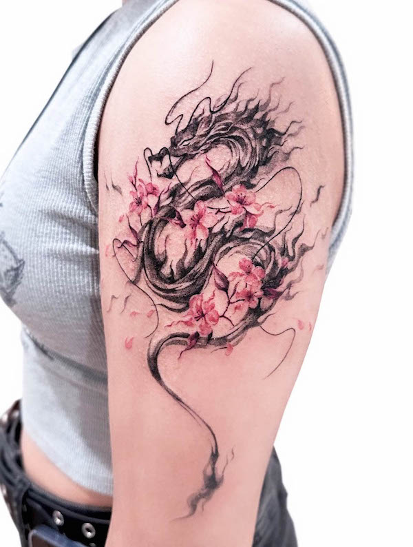 Dragon and cherry blossom sleeve tattoo by @uzotattoo