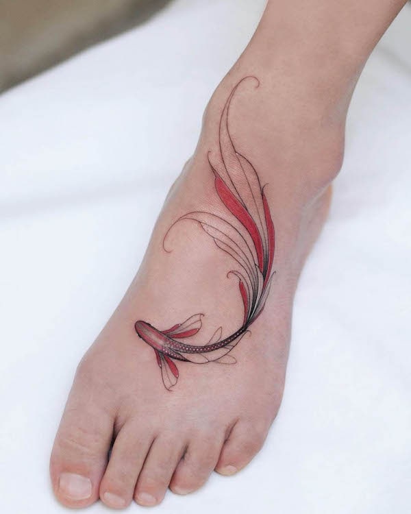 Elegant koi fish foot tattoo by @nastyafox