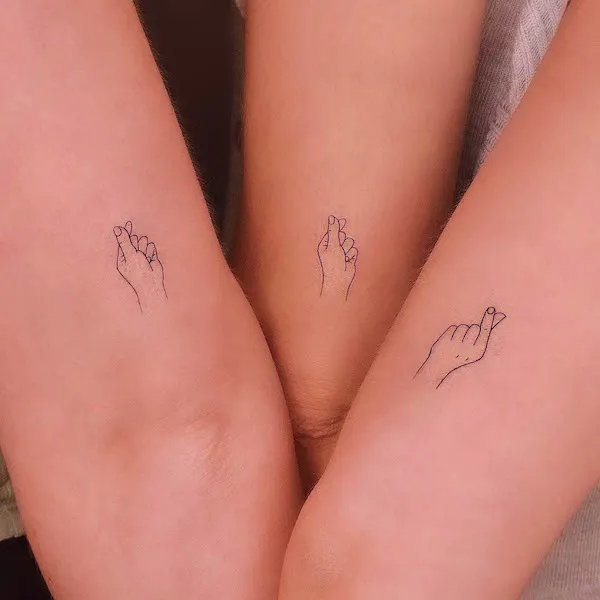 Finger heart matching tattoos tattoo by @tattooer_jina