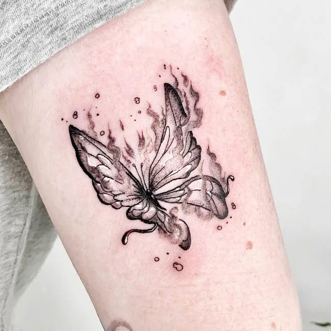 Fire butterfly arm tattoo by @corrupt_file