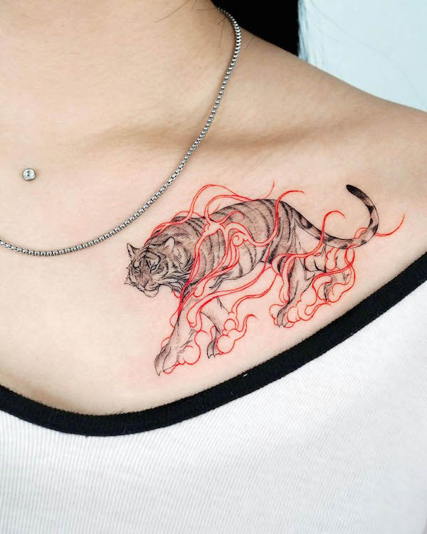 Fire tiger collarbone tattoo by @bium_tattoo