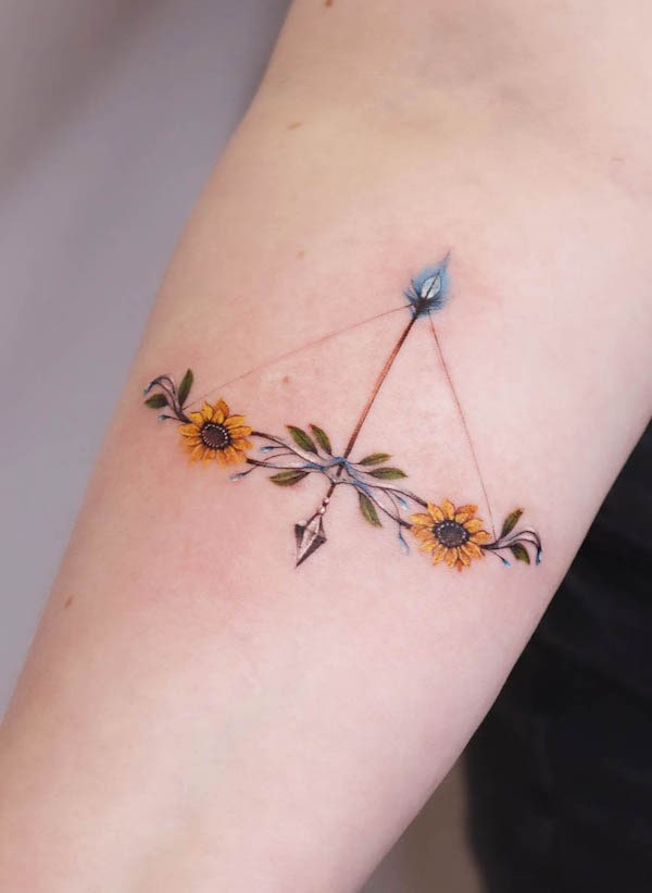 Floral arrow tattoo for women by @maiko