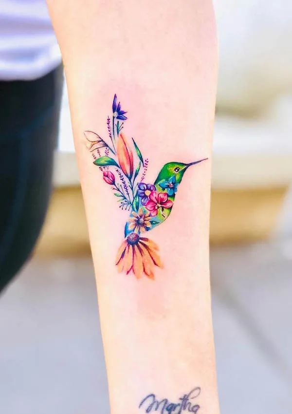 Floral bird forearm tattoo for women by @claudiogajardo.art_