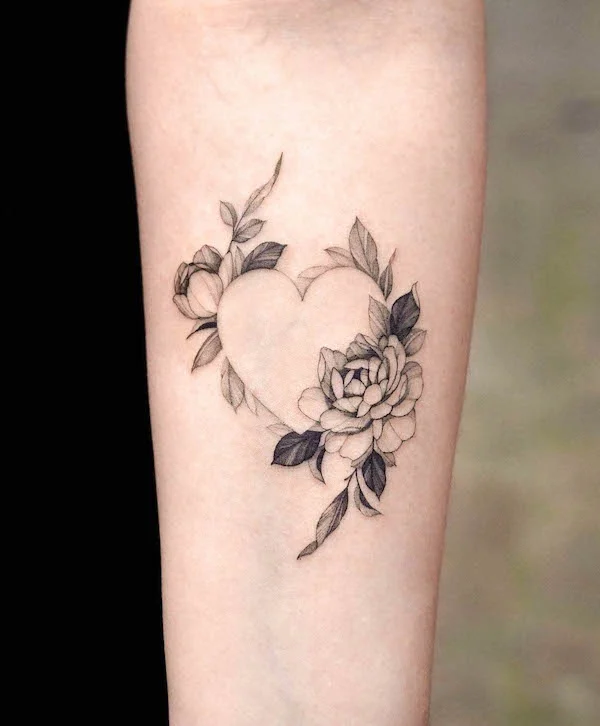 Floral black and grey heart tattoo by @zeetattoo