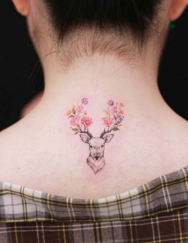 Floral deer tattoo by @donghwa_tattoo