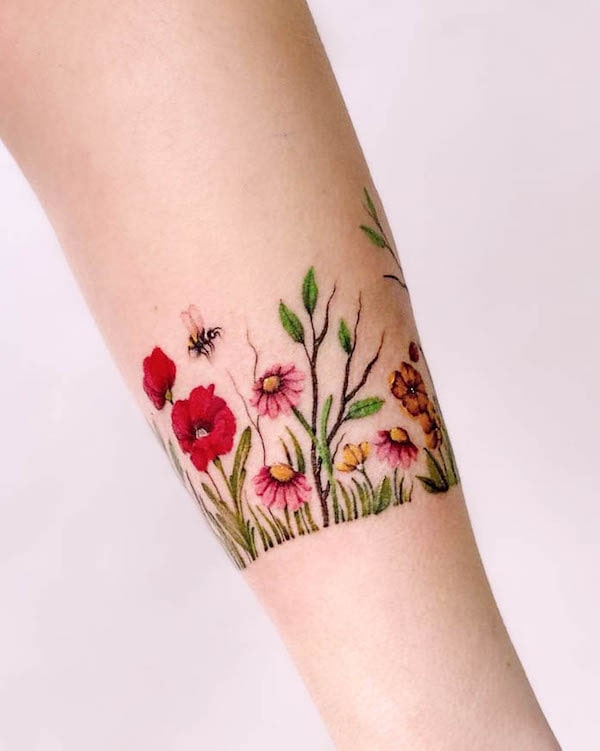 Flower garden bracelet tattoo by @maiko.only