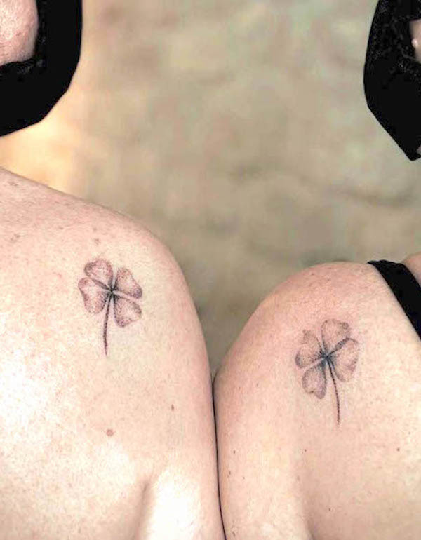 Four leaf clover matching shoulder tattoos by @melpzvc