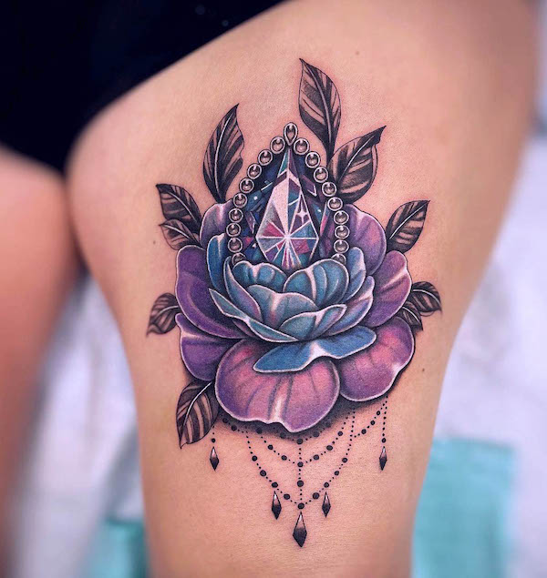 Gemstone and rose thigh tattoo by @inkandartbyida