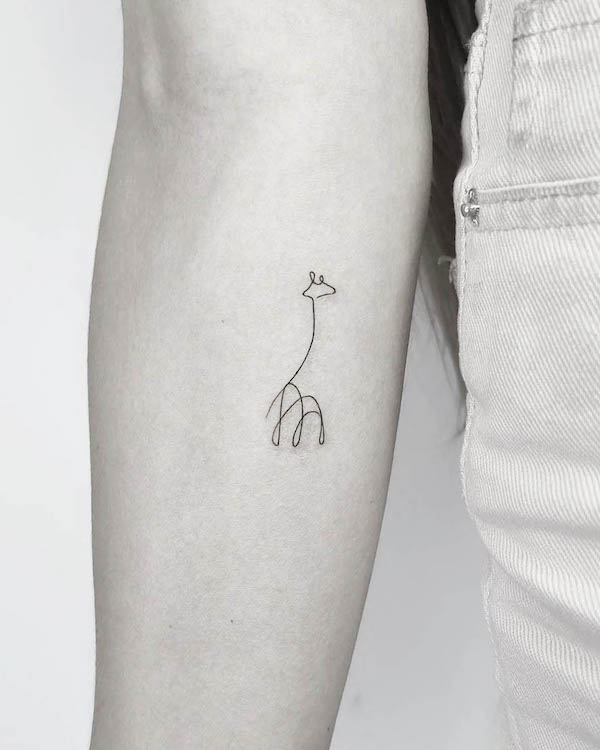 Giraffe one-line initial tattoo by @tattooivek