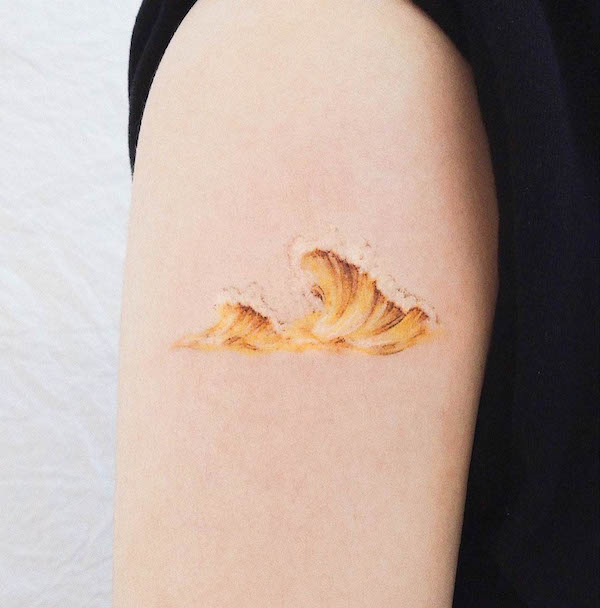 Golden wave tattoo by @yezottt