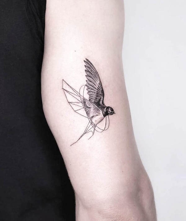 Half-outline half-realistic swallow by @jaimeroglestattoo