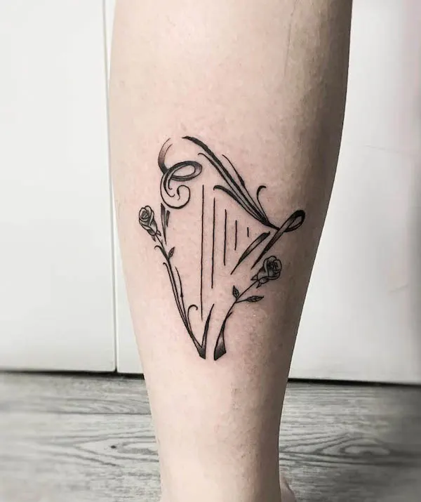 Harp tattoo by @bloom__tattoo