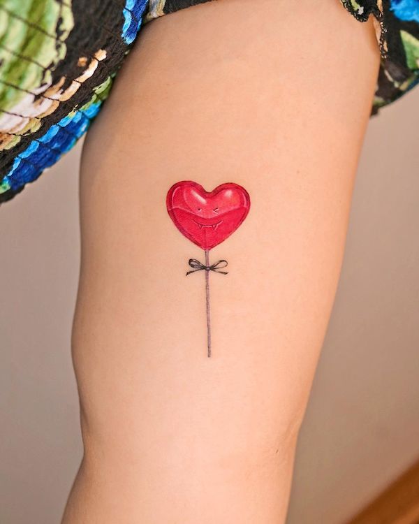 Heart lollipop tattoo by @tattooist_yun