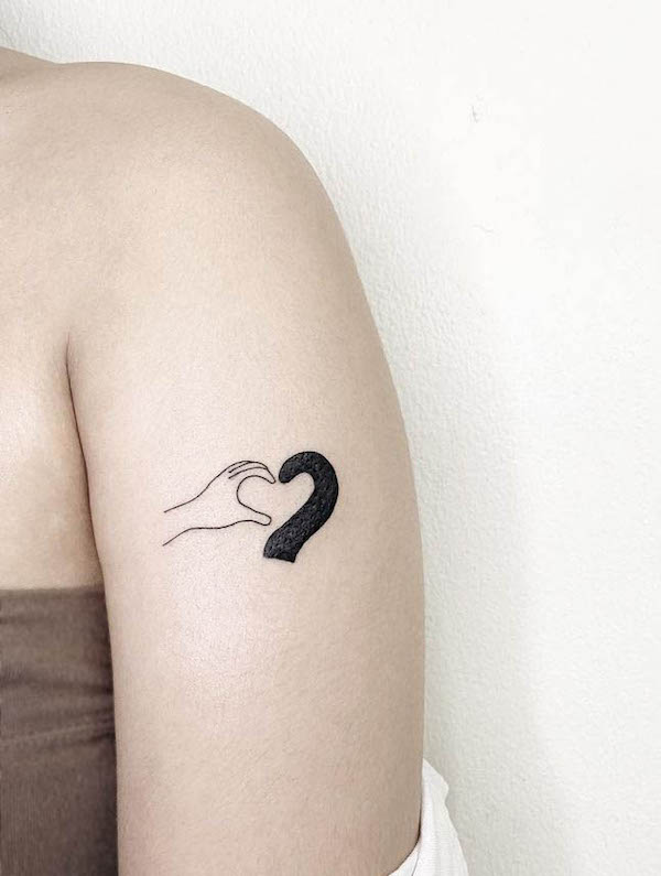 Heart shape yin yang tattoo by @pett.on_.ink