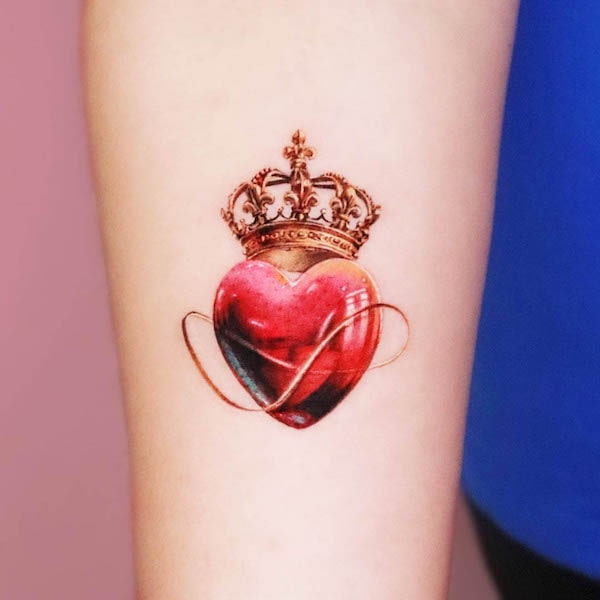 Infinity heart and crown tattoo by @studio_jaw