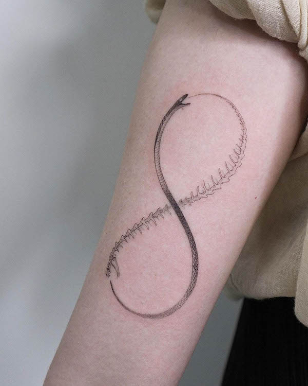 Infinity ouroboros forearm tattoo by @choseung.tat_