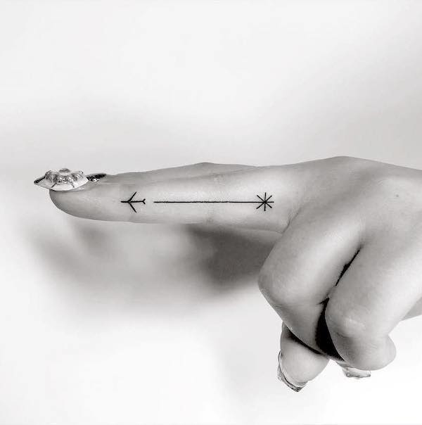 Inner finger airplane tattoo by @playground_tat2