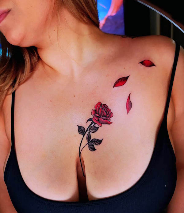 Letting go rose chest tattoo by @gemini_haz