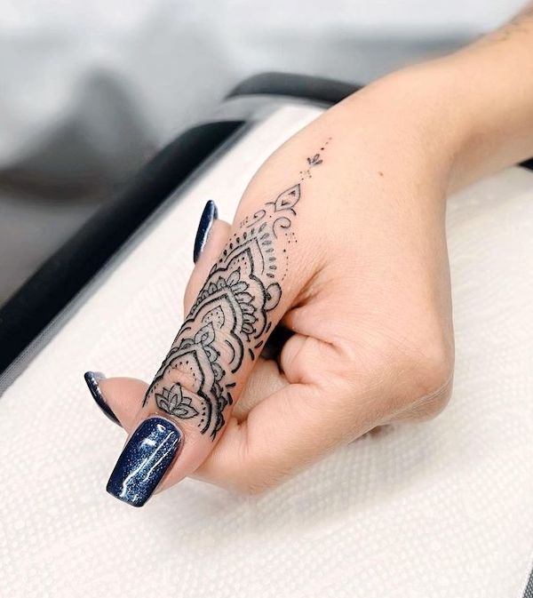 Mandala finger tattoo by @anais_chabane