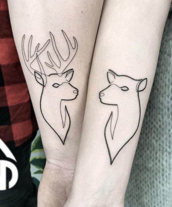 Matching deer tattoos for couples by @miyo.tattoo