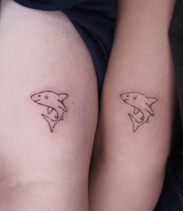 Matching simple shark tattoos by @tinybaki