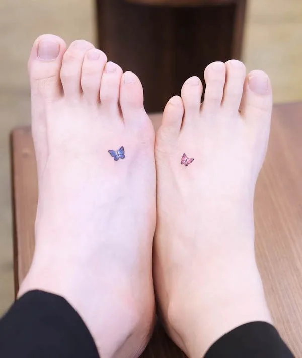 Matching tiny butterfly foot tattoos by @wittybutton_tattoo