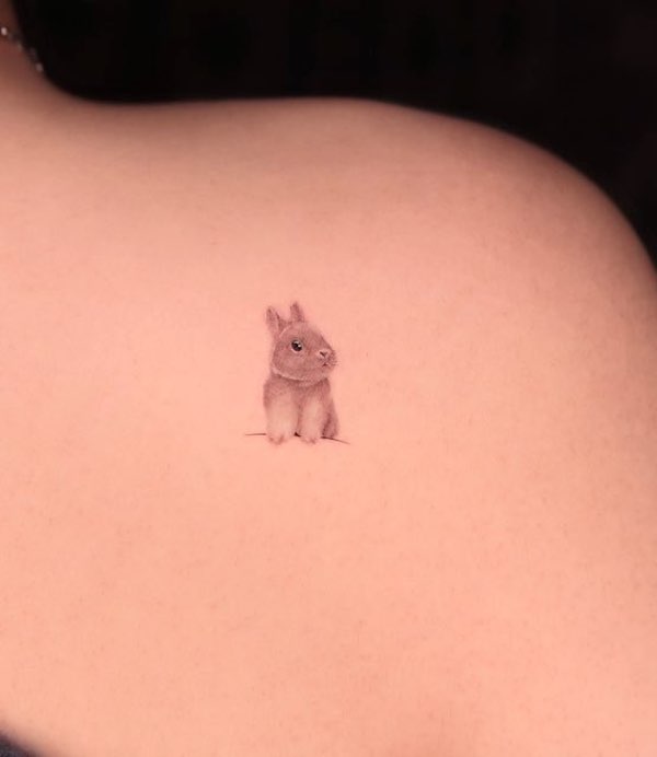 Micro-realism rabbit tattoo by @tattxxis