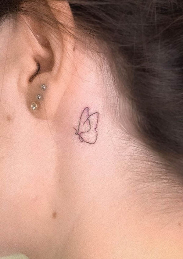 Minimalist behind the ear butterfly tattoo by @marolinesofficial