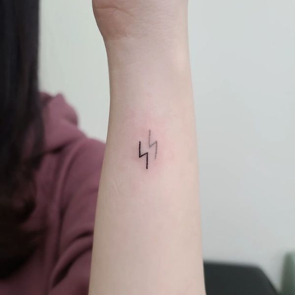 Minimalist lightning tattoo by @wooha_ta2