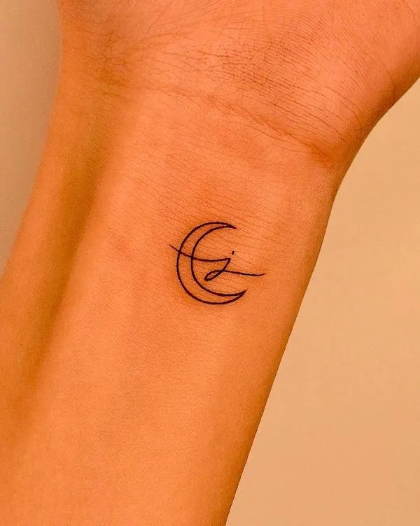 Minimalist moon and initial tattoo by @tattooer_jina