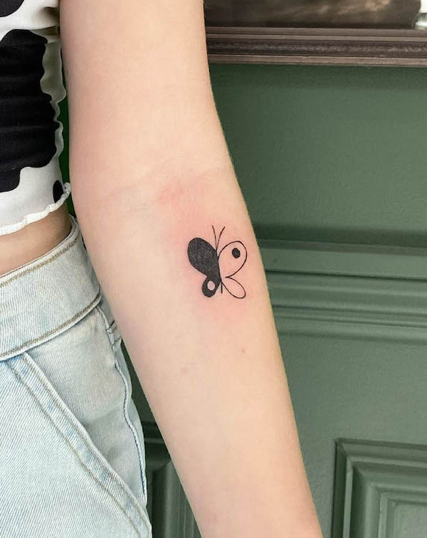 Minimalist yin yang butterfly tattoo by @mclametattoos