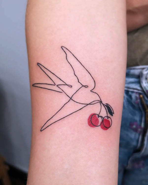 One-line swallow and cherry tattoo by @mermaidtattoogallery