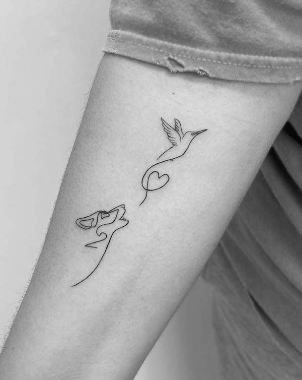 One-line wolf and bird tattoo by @tinytattoosbycuallistudio