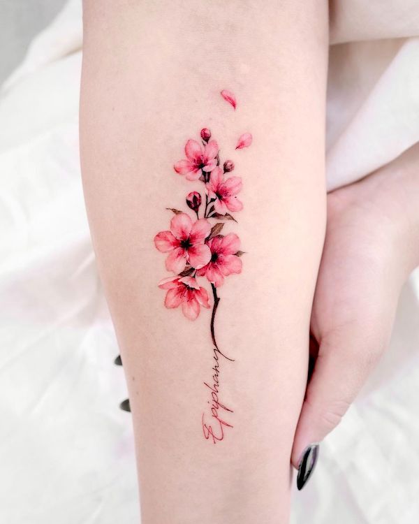 One-word cherry blossom tattoo by @donghwa_tattoo