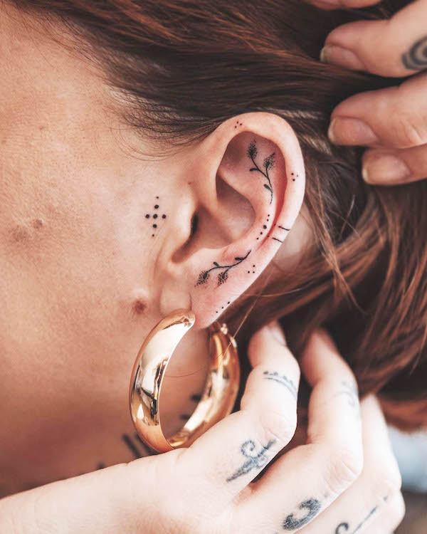 Ornamental ear tattoo by @mzinaz