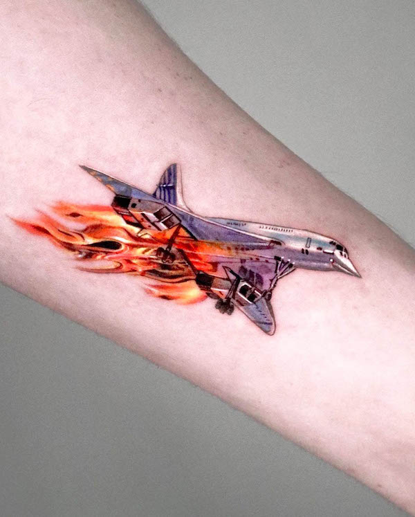 Plane crash tattoo by @tattooist_irae2