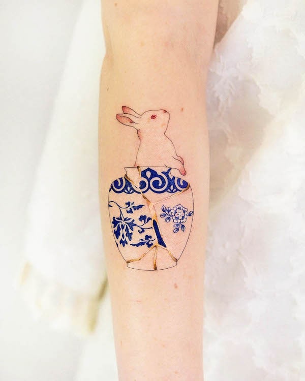 Porcelain rabbit forearm tattoo by @adelaide.tattooing