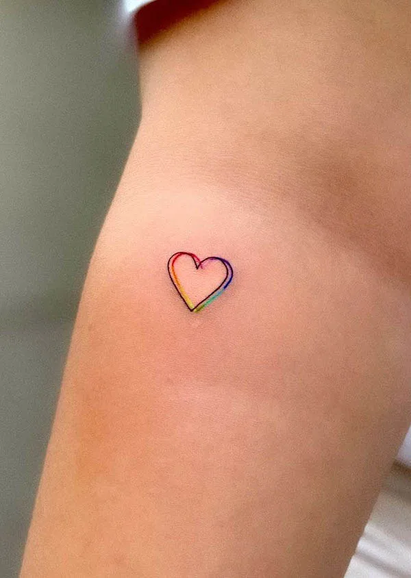 Rainbow heart tattoo by @zilandogantattoo