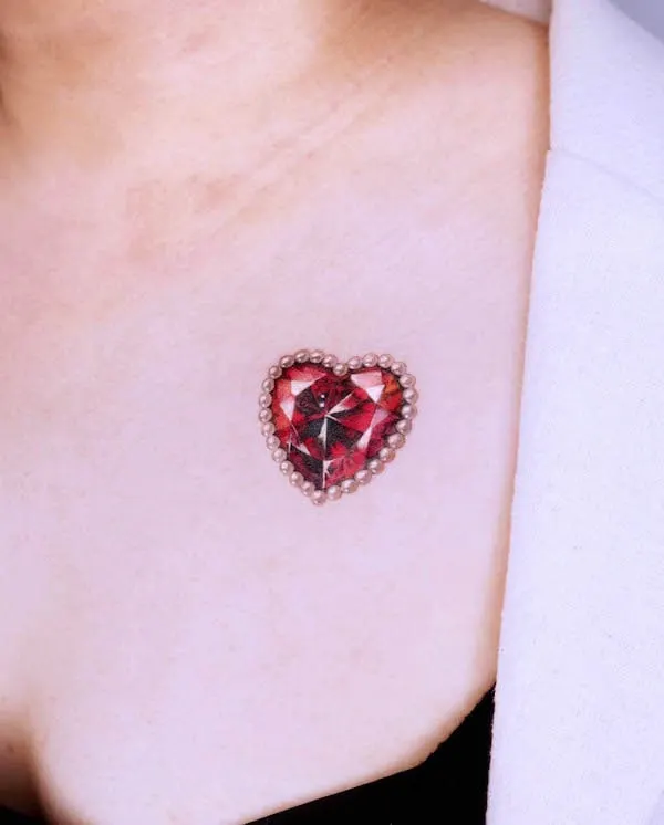 Red diamond heart tattoo by @tattooist_siia