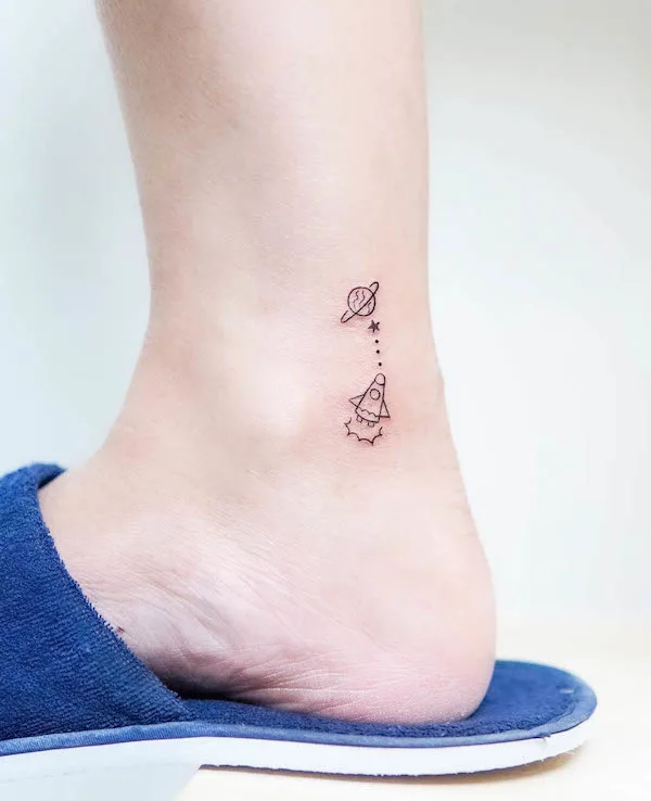 Rocket and planet ankle tattoo by @yarktattoo