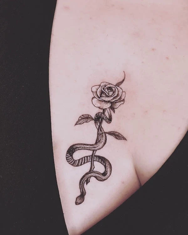 Rose and snake chest tattoo by @hollieink